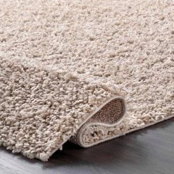 Kara Solid Shag Beige 8 ft. 10 in. x 12 ft. Area Rug by nuLOOM -nuLOOM Sales Store beige nuloom area rugs kkbx01d 9012 1f 1000