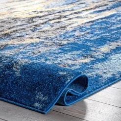Katharina Modern Abstract Blue 5 ft. x 8 ft. Area Rug by nuLOOM -nuLOOM Sales Store blue nuloom area rugs rzbd04a 53079 4f 1000