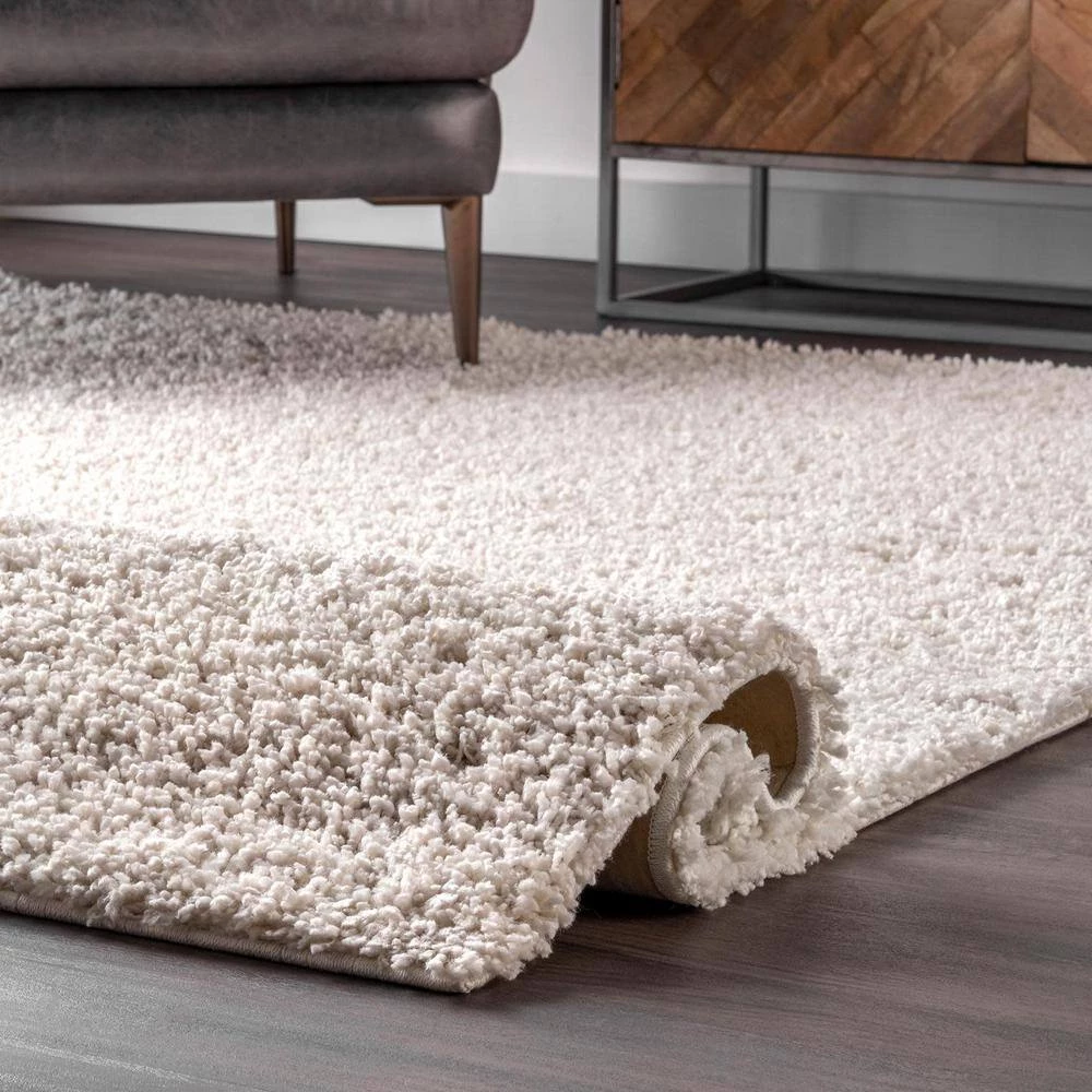 Clare Solid Shag Cream White 8 ft. x 10 ft. Area Rug by nuLOOM 5 Clare Solid Shag Cream White 8 ft. x 10 ft. Area Rug by nuLOOM - Image 5