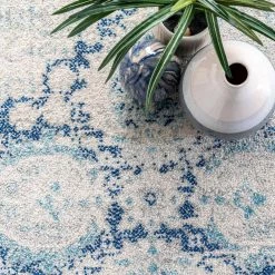 Pauley Vintage Light Blue 12 ft. x 15 ft. Area Rug by nuLOOM -nuLOOM Sales Store light blue nuloom area rugs rzbd24a 12015 4f 1000