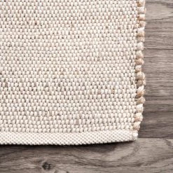Elfriede Solid Jute Natural 9 ft. x 12 ft. Area Rug by nuLOOM -nuLOOM Sales Store natural nuloom area rugs hmmt01a 9012 1f 1000