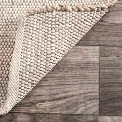Elfriede Solid Jute Natural 9 ft. x 12 ft. Area Rug by nuLOOM -nuLOOM Sales Store natural nuloom area rugs hmmt01a 9012 44 1000