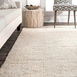 Elfriede Solid Jute Natural 9 ft. x 12 ft. Area Rug by nuLOOM -nuLOOM Sales Store natural nuloom area rugs hmmt01a 9012 4f 1000