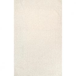 Marlow Soft Shaggy Faux Sheepskin Machine Washable White 6 ft. x 9 ft. Indoor Area Rug by nuLOOM